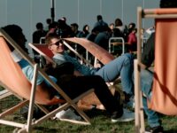 student sitting in the sun