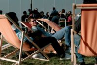 student sitting in the sun